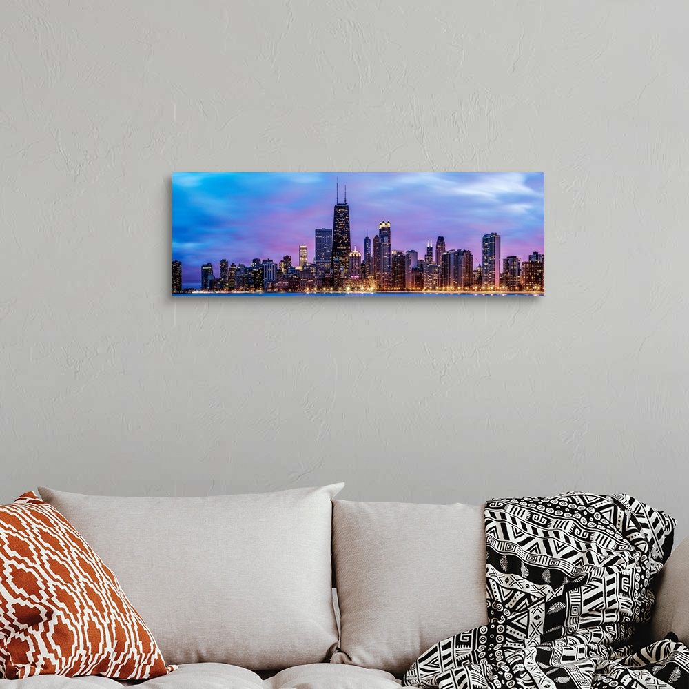 A bohemian room featuring Photo of Chicago skyline at night under cotton candy colored clouds.