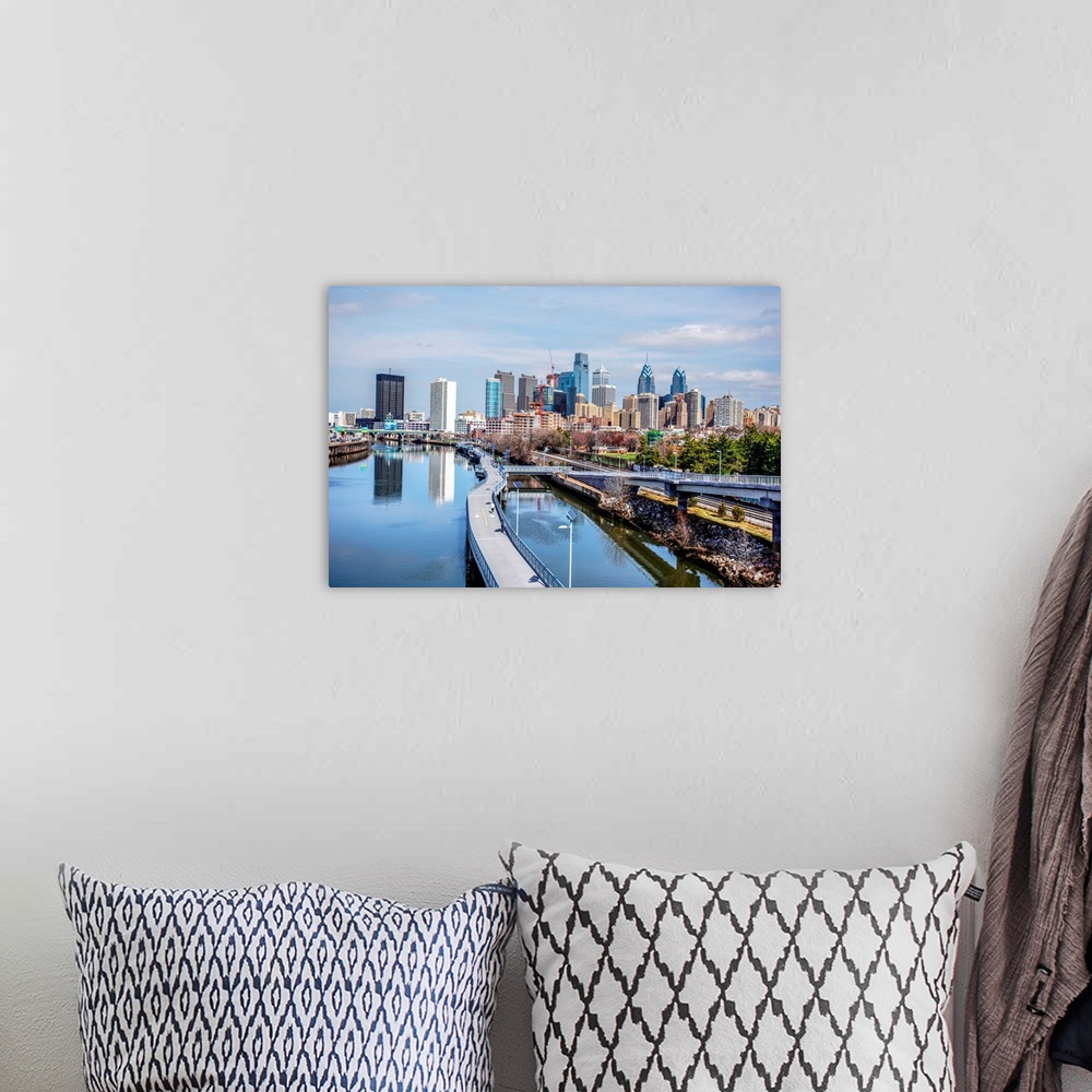 A bohemian room featuring View of skyscrapers in Philadelphia, Pennsylvania, seen from the waterway.
