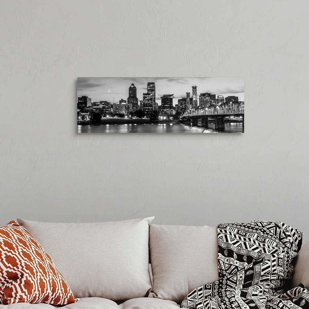 A bohemian room featuring Panoramic photograph of the Portland, Oregon skyline lit up with lights at the beginning of sunse...