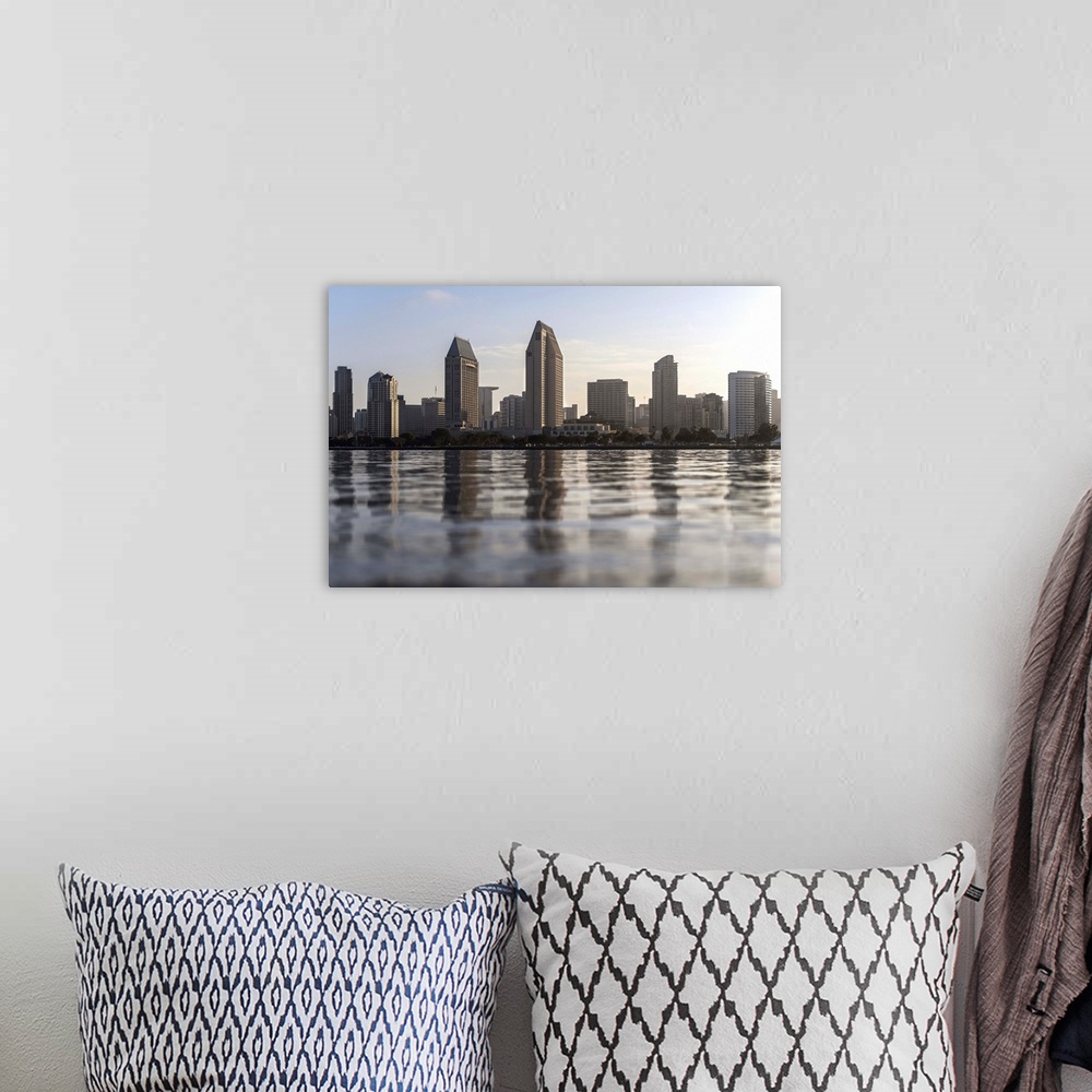 A bohemian room featuring Photograph of the San Diego, California skyline from the water just before sunset.