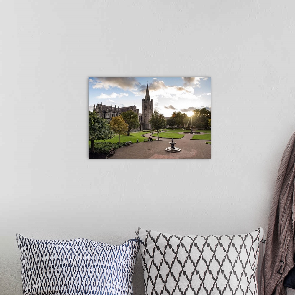 A bohemian room featuring Photograph of St Patrick's Cathedral in Dublin, Ireland, with a courtyard in the foreground.