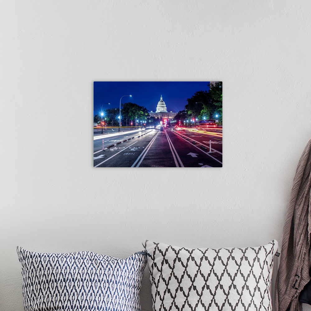 A bohemian room featuring Streetview of the US Capitol Building at night in Washington DC.