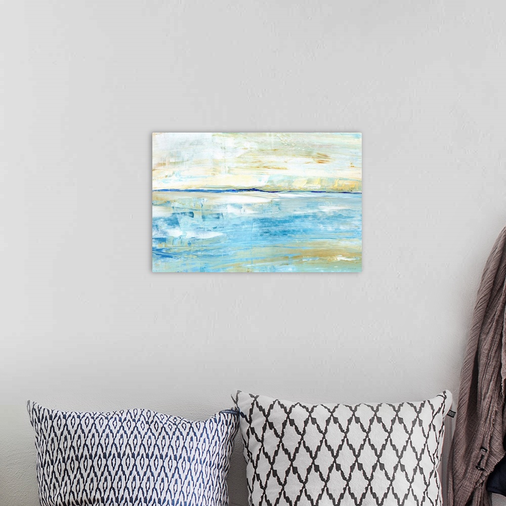 A bohemian room featuring Horizontal abstract painting of a seascape horizon in shades of blue and beige.