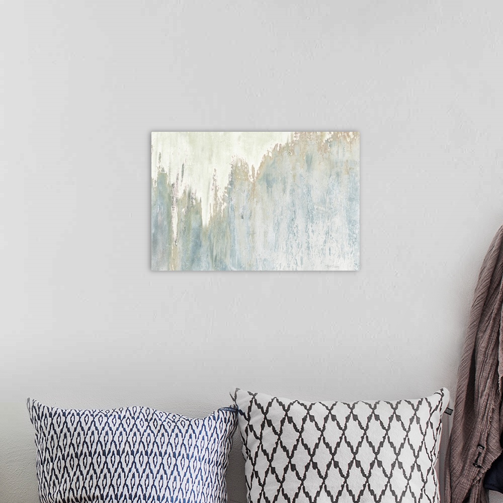 A bohemian room featuring Horizontal abstract painting in muted tones of blue, brown and gray.
