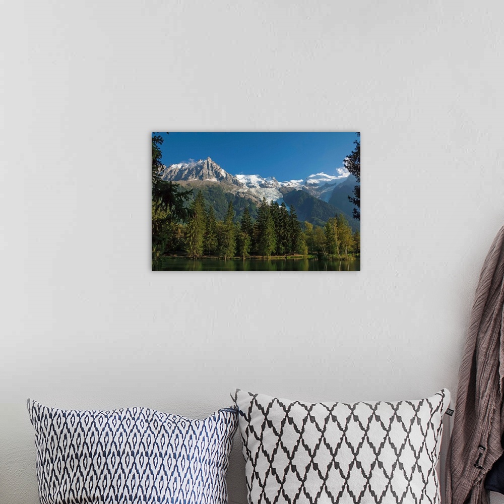 A bohemian room featuring Aiguile du Midi and Mont Blanc, 4809m, and the Glaciers, from the Lake, Chamonix, Haute Savoie, F...
