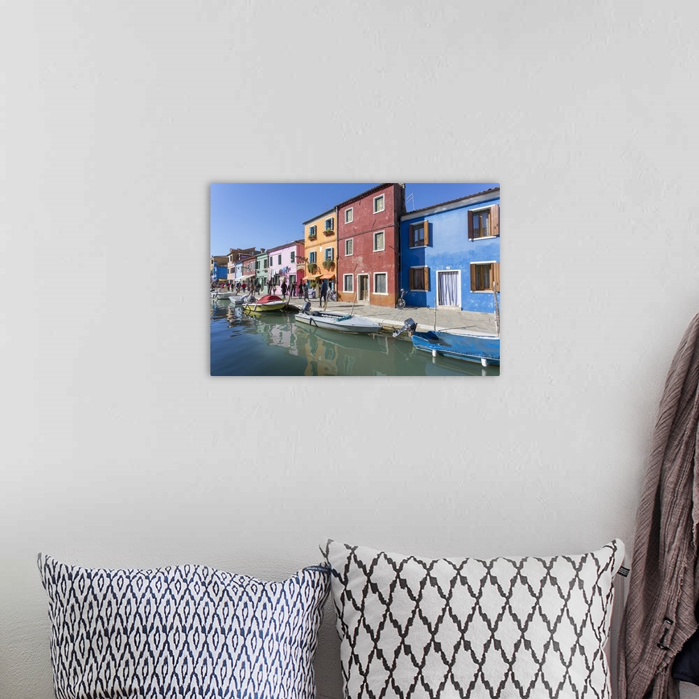 A bohemian room featuring Canal and colourful facade, Burano, Veneto, Italy, Europe