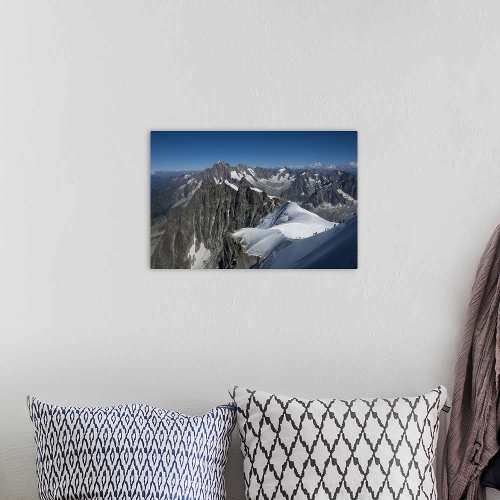 A bohemian room featuring Climbers on a snowfield approaching the Aiguile du Midi, 3842m, Graian Alps, Chamonix, Haute Savo...