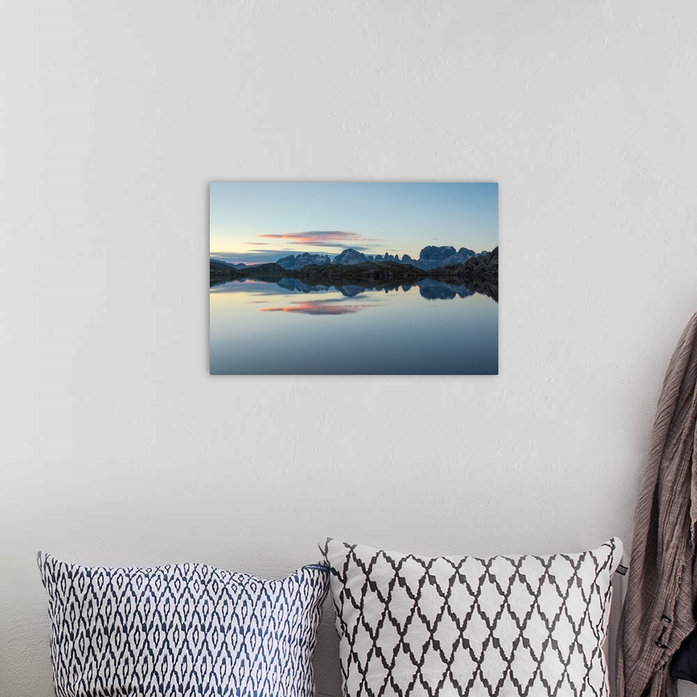 A bohemian room featuring Blue sky and pink clouds reflected in Lago Nero at dawn, Cornisello Pinzolo, Brenta Dolomites, Tr...