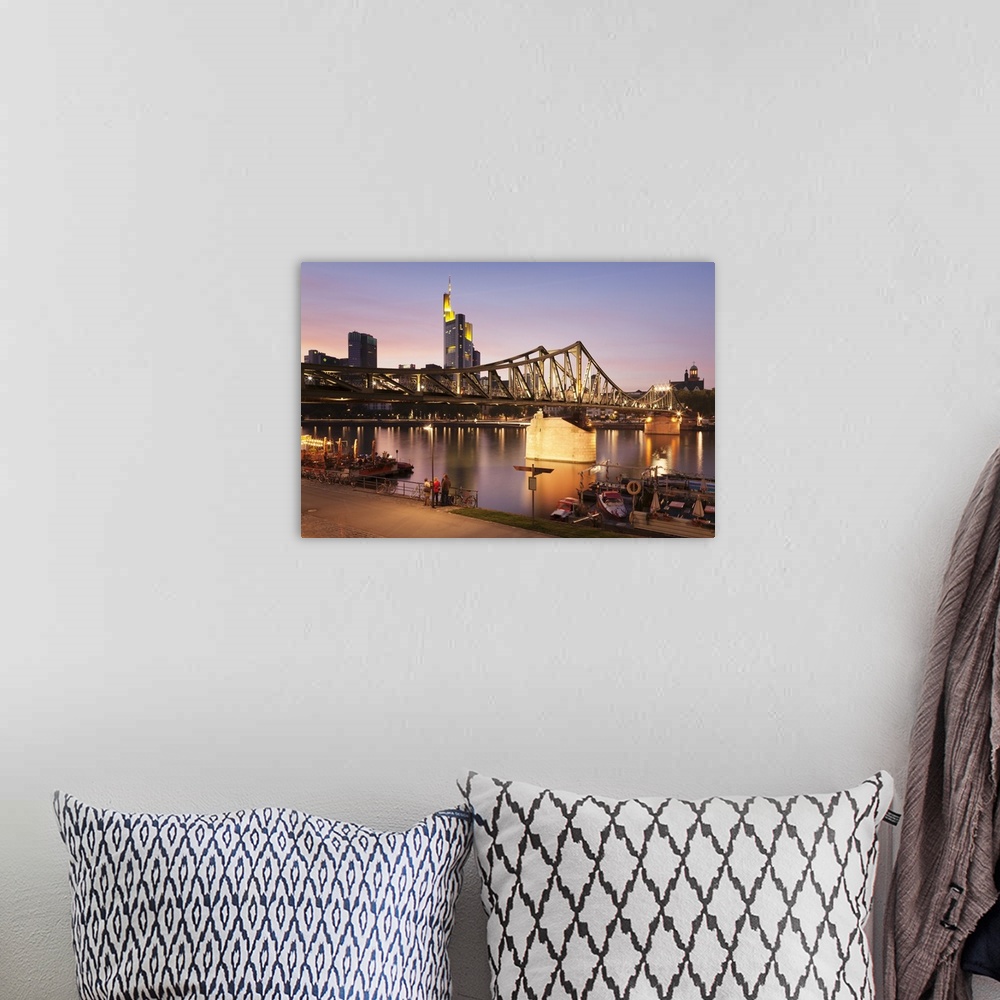 A bohemian room featuring Eiserner Steg Bridge and financial district at sunset, Frankfurt, Hesse, Germany, Europe