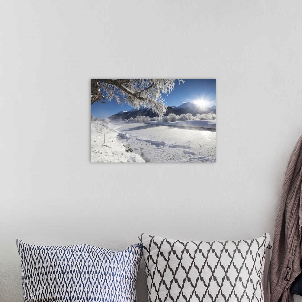 A bohemian room featuring Frost on trees frame the snowy landscape and frozen river, Inn, Celerina, Maloja, Canton of Graub...