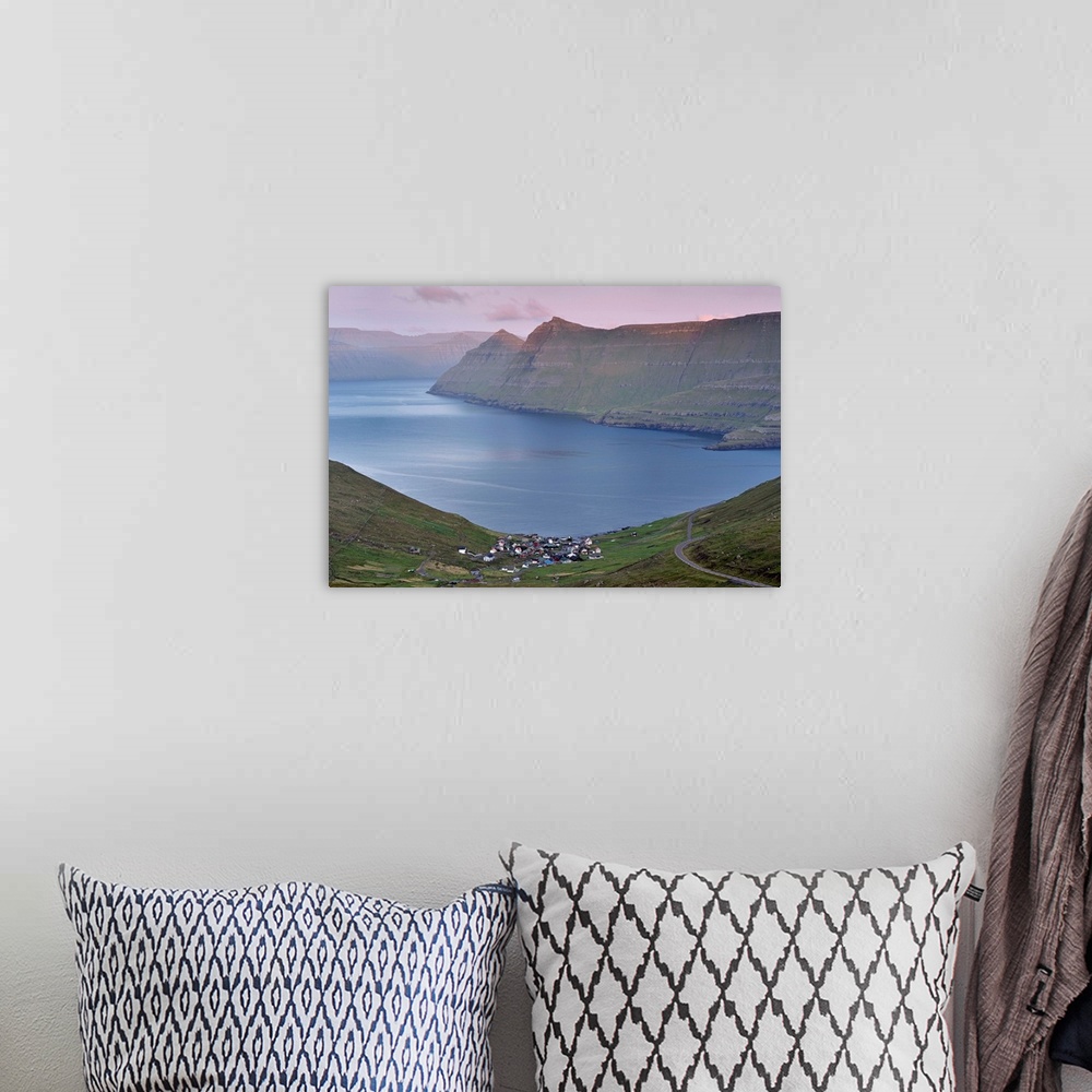 A bohemian room featuring Funningur in Funningsfjordur, with view on Eysturoy and Kalsoy  steep hills, at sunset. Eysturoy,...