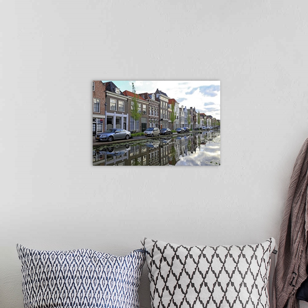 A bohemian room featuring Houses on Turfmarkt in Gouda, South Holland, Netherlands