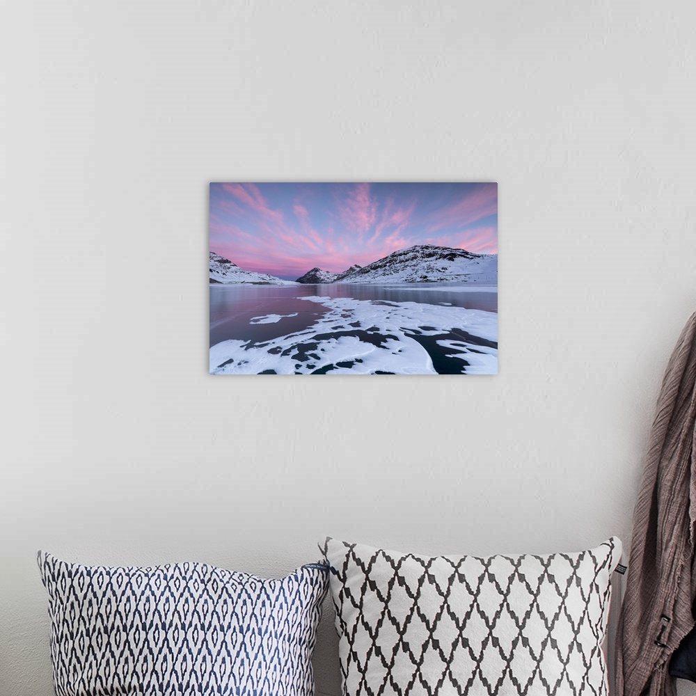 A bohemian room featuring The frozen Lago Bianco framed by pink clouds at dawn, Bernina Pass, canton of Graubunden, Engadin...