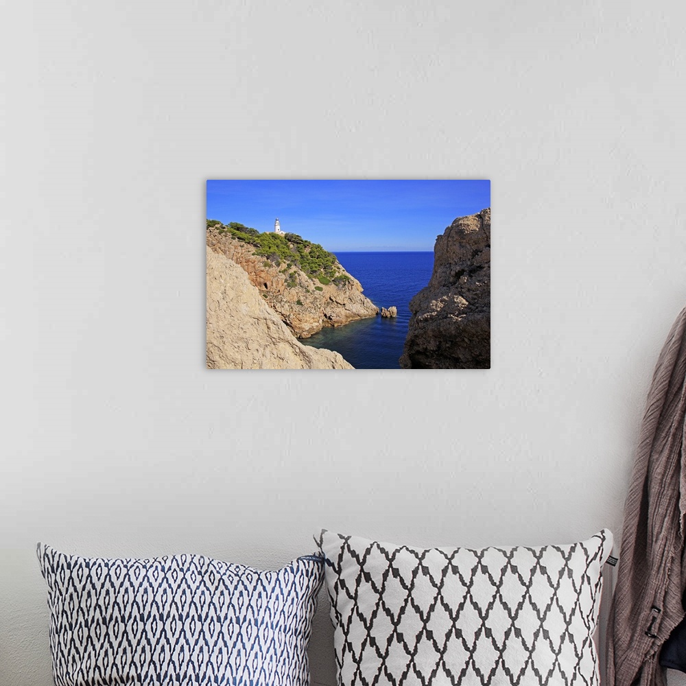 A bohemian room featuring Lighthouse at Cap de Pera near Cala Ratjada, Majorca, Balearic Islands, Spain