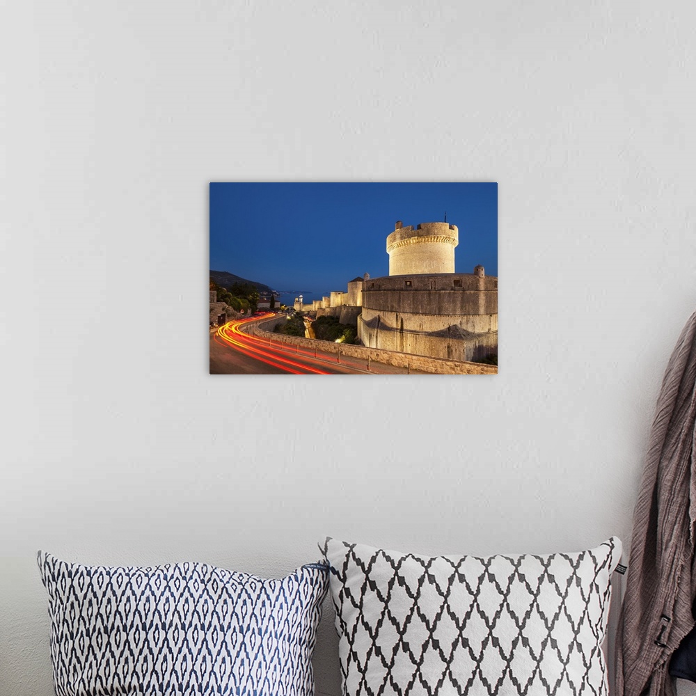 A bohemian room featuring Minceta tower and city walls with traffic light trails, Dubrovnik Old Town, Dubrovnik, Dalmatian ...