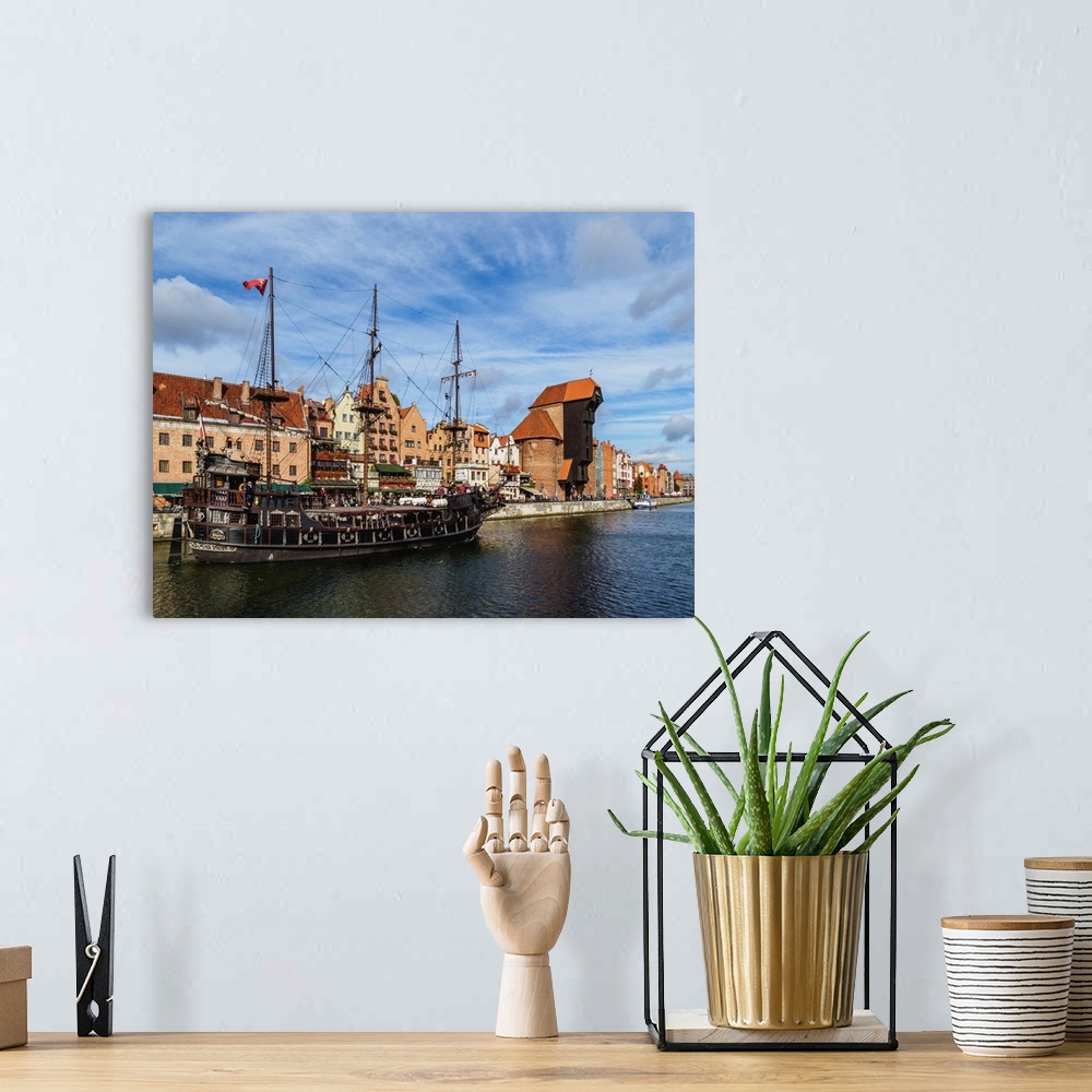 A bohemian room featuring Motlawa River and Medieval Port Crane Zuraw, Old Town, Gdansk, Pomeranian Voivodeship, Poland