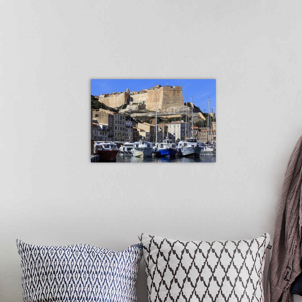 A bohemian room featuring Old citadel view with yachts in the marina, Bonifacio, Corsica, France, Mediterranean, Europe