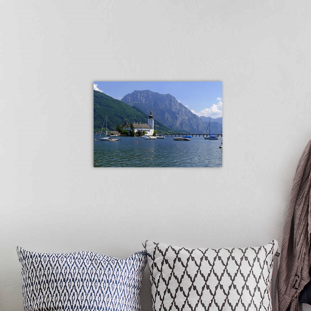 A bohemian room featuring Ort Castle in the Town of Gmunden on Lake Traunsee, Salzkammergut, Upper Austria, Austria