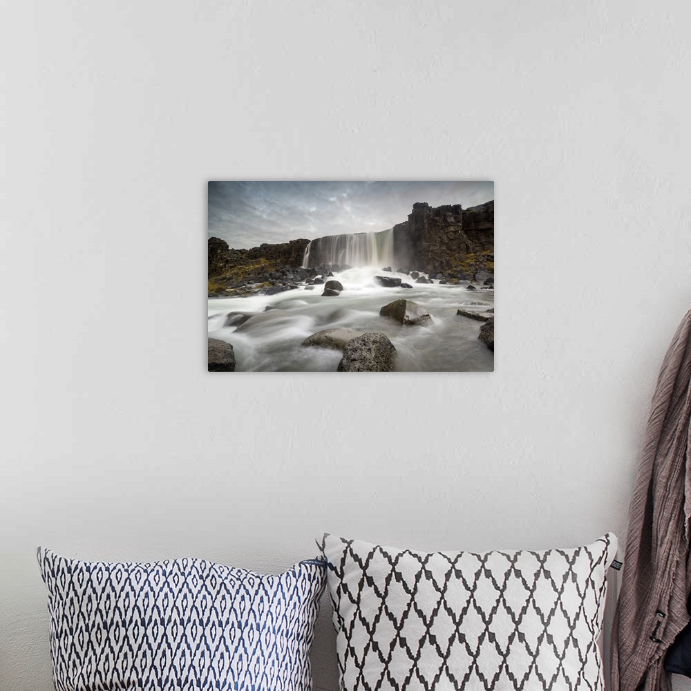 A bohemian room featuring Oxararfoss waterfall, Thingvellir National Park, Iceland