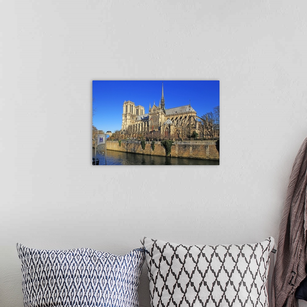 A bohemian room featuring Seine River with Notre Dame Cathedral, Paris, Ile de France, France