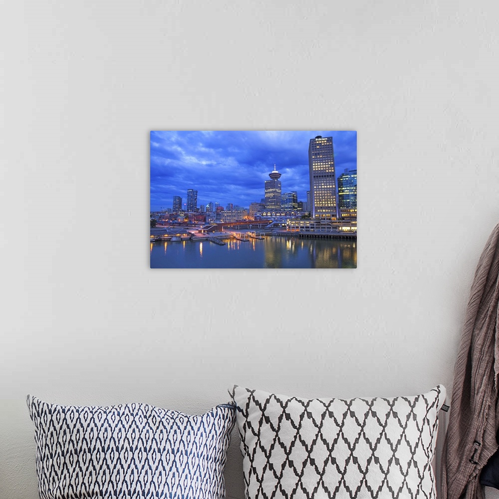 A bohemian room featuring Skyline and the waterfront in the evening, Vancouver, Canada