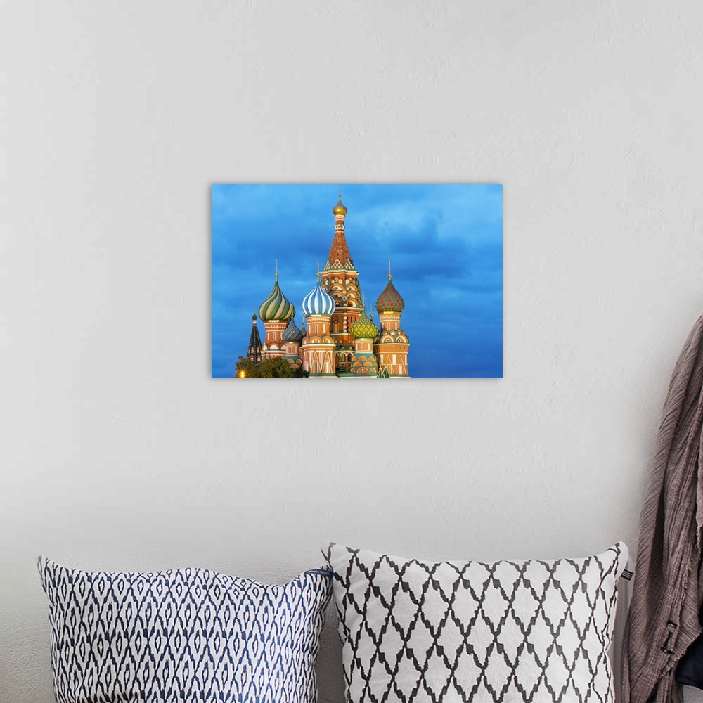 A bohemian room featuring St. Basil's Cathedral lit up at night, Moscow, Russia