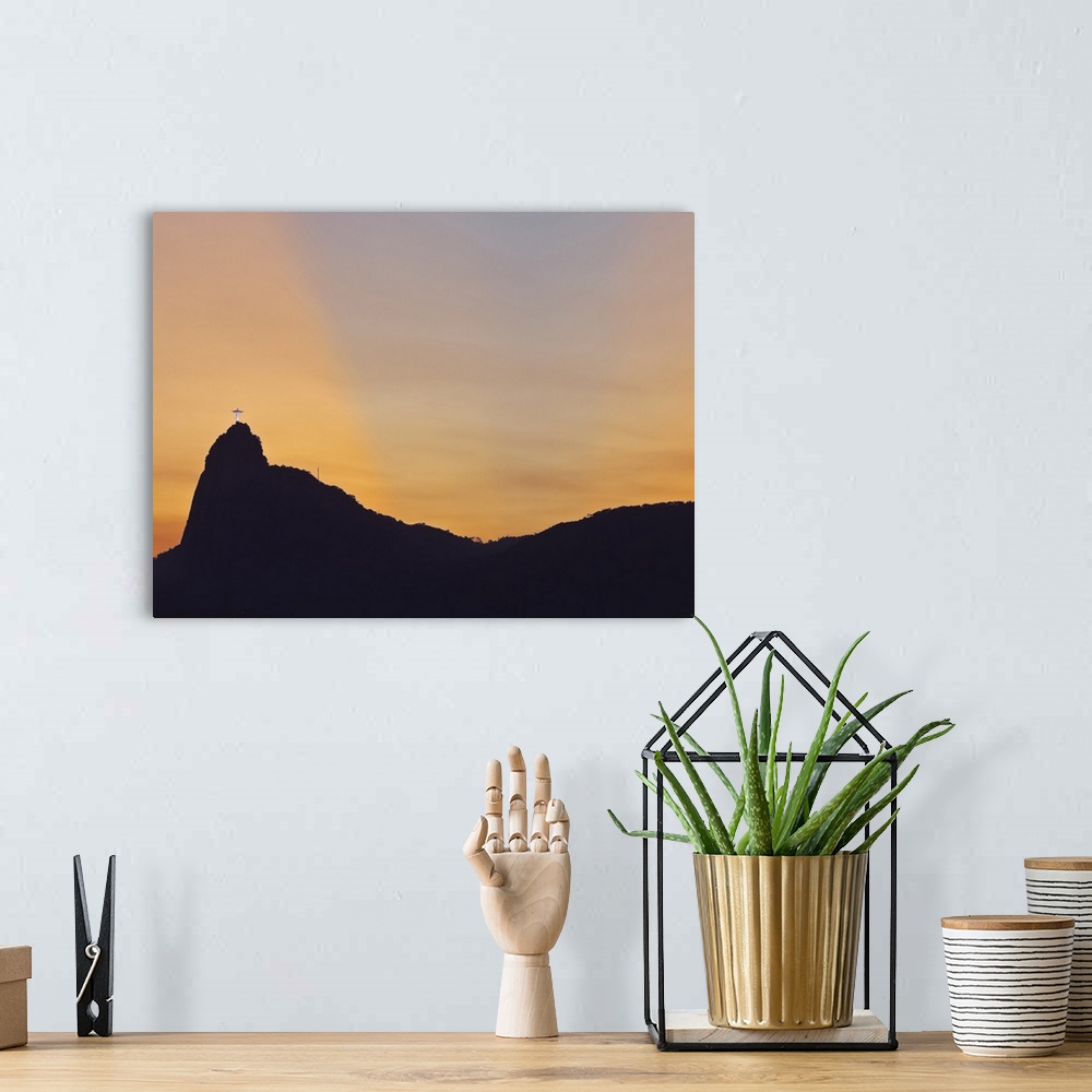 A bohemian room featuring Sunset view of Christ the Redeemer statue and Corcovado Mountain, Rio de Janeiro, Brazil, South A...