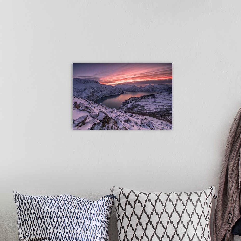 A bohemian room featuring The frozen sea surrounded by snow framed by pink clouds, Arctic, Norway, Scandinavia, Europe