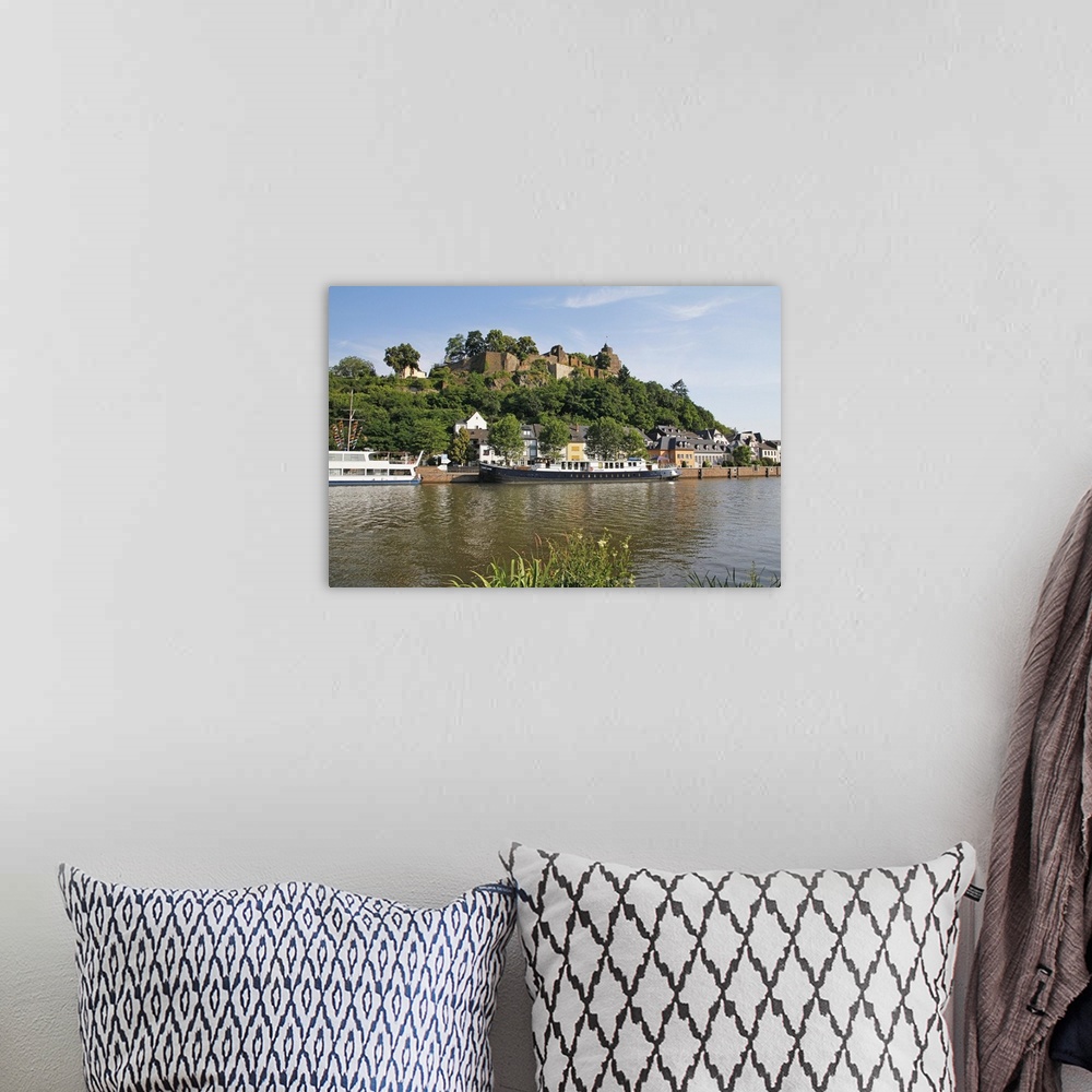 A bohemian room featuring Tour Boats with Castle Ruin in Saarburg on Saar River, Rhineland-Palatinate, Germany