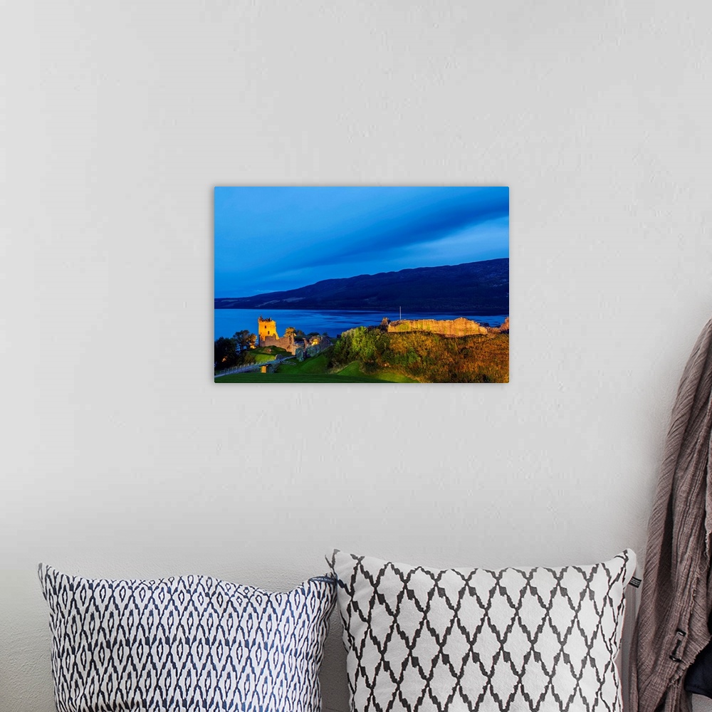 A bohemian room featuring Twilight view of Urquhart Castle and Loch Ness, Highlands, Scotland, United Kingdom, Europe