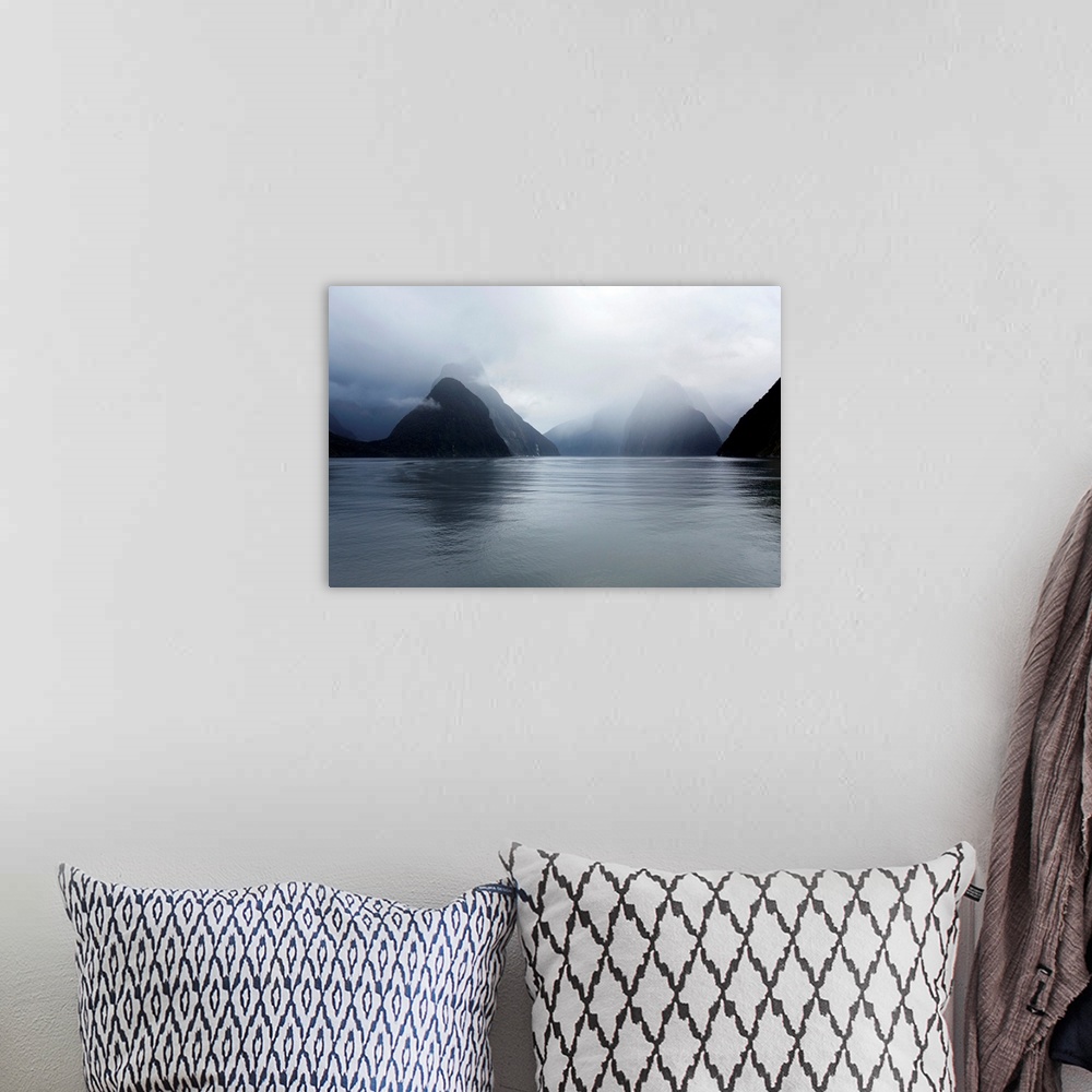 A bohemian room featuring View down rainswept Milford Sound, mountains obscured by cloud, Milford Sound, Fiordland National...