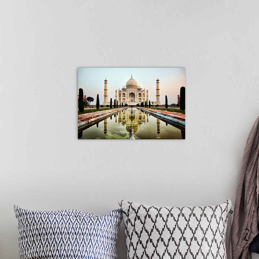 A bohemian room featuring Photograph of an ornate marble mausoleum.  A reflection pool is located in front lined with tall ...