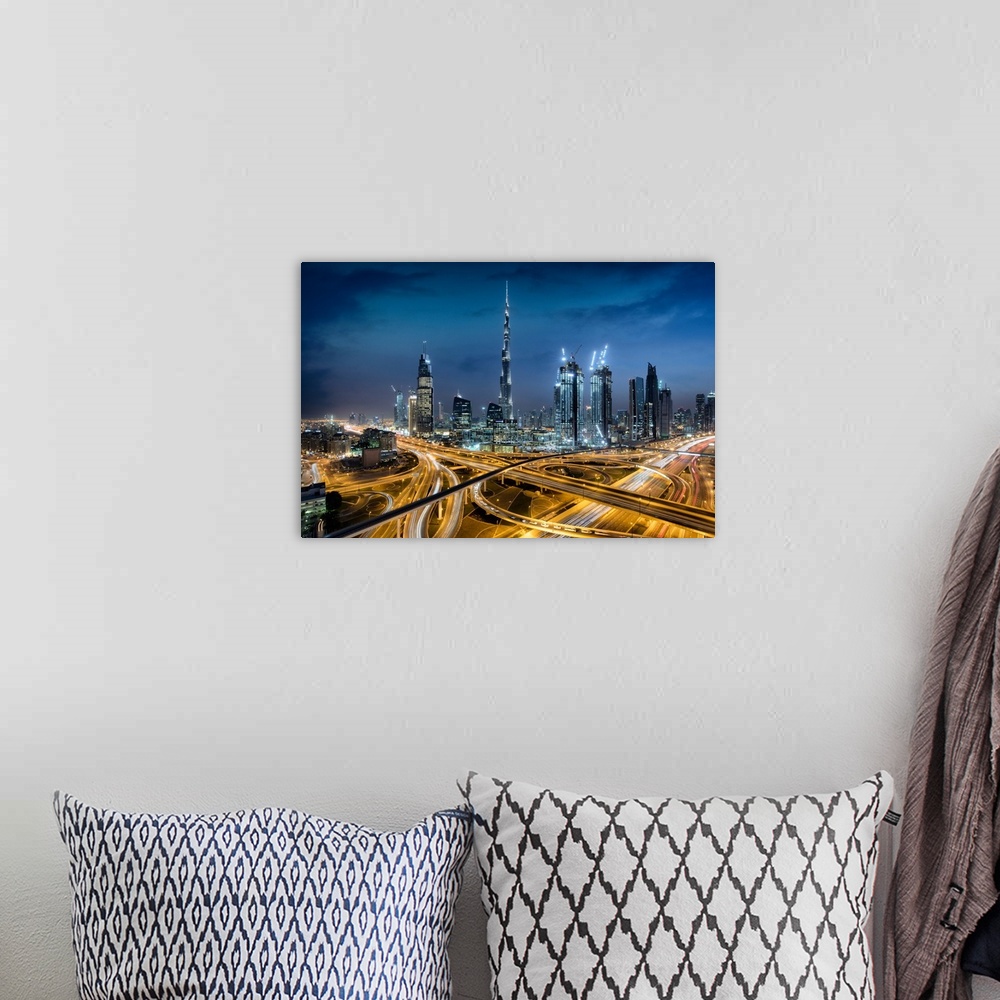 A bohemian room featuring The Burj Khalifa and massive interchange of Dubai.
