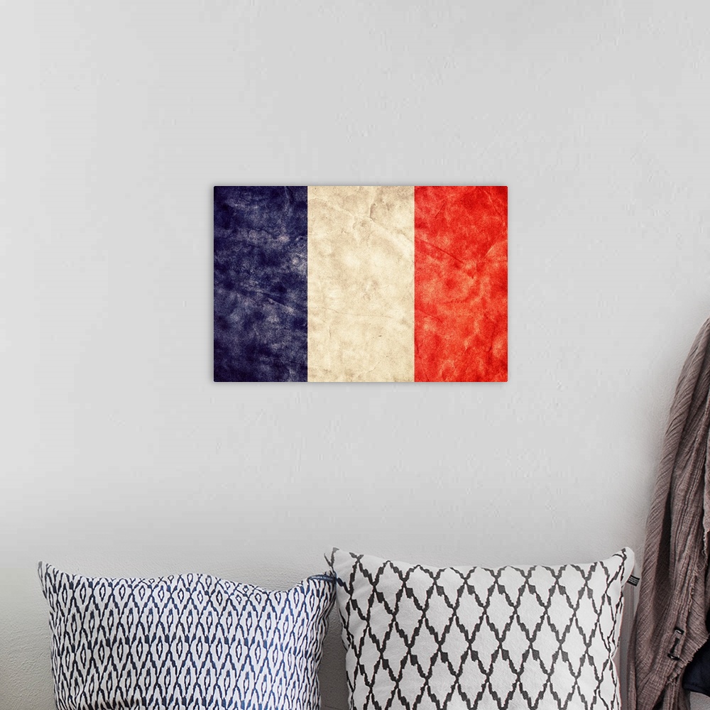 A bohemian room featuring French flag in a grunge style.