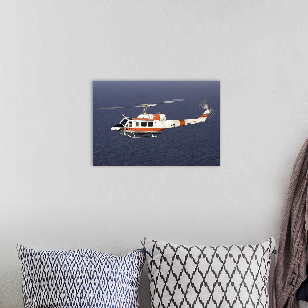 A bohemian room featuring A Bell 212 helicopter of the Uruguayan Air Force off the coast of Montevideo, Uruguay.