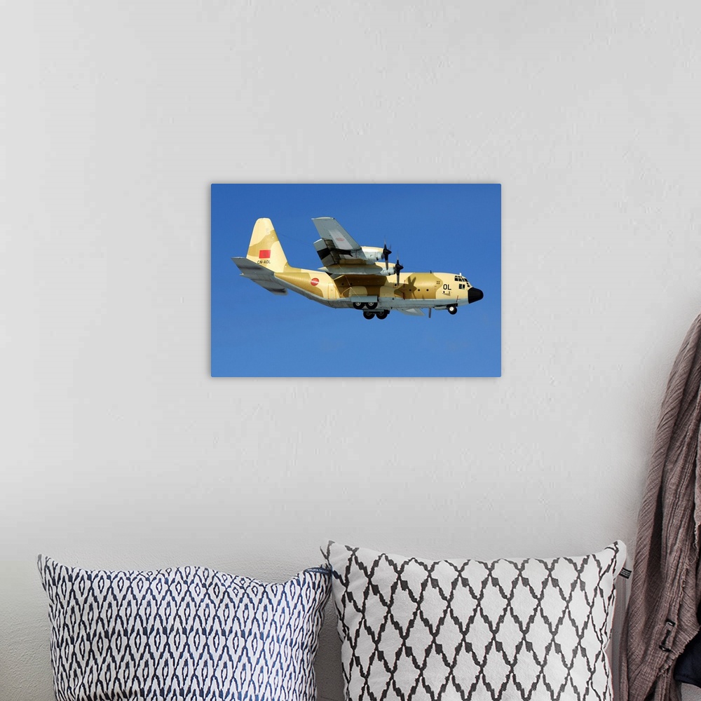A bohemian room featuring A C-130H Hercules military transport airplane of the Royal Moroccan Air Force.