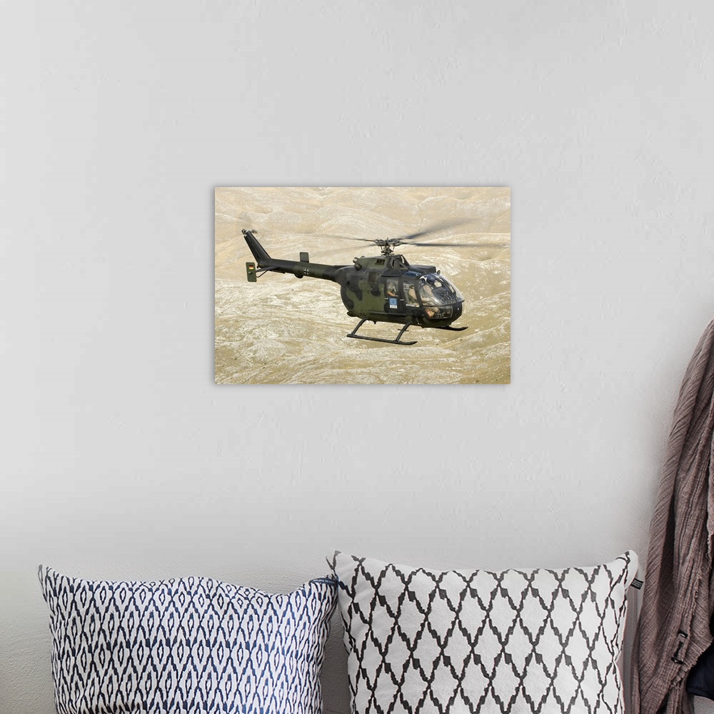 A bohemian room featuring A German Army Bo-105P helicopter near Mount Igman in Bosnia-Herzegovina.