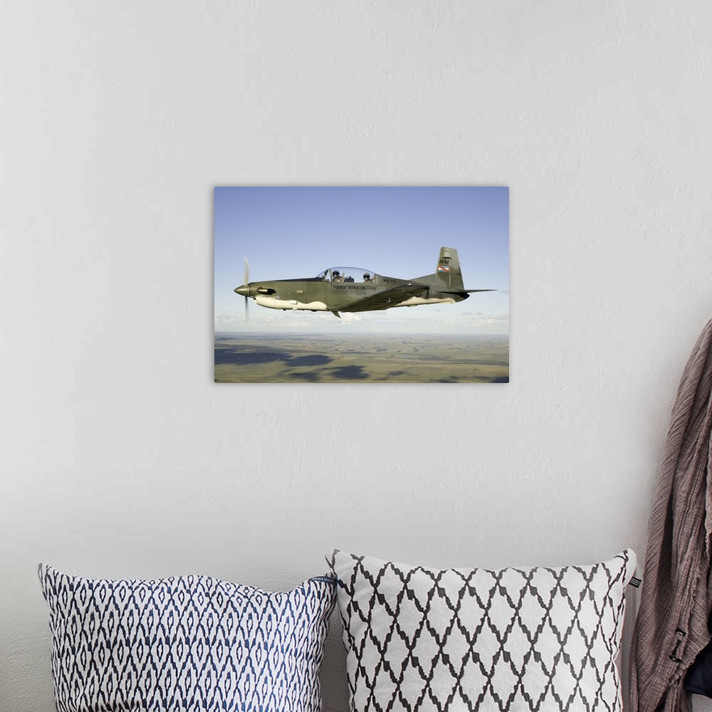 A bohemian room featuring A PC-7U, locally referred to as AT-92, of the Uruguayan Air Force.