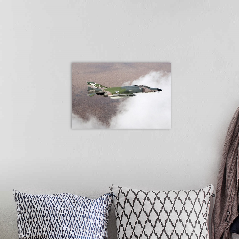 A bohemian room featuring A QF-4E Phantom flying over the White Sands Missile Range in New Mexico.