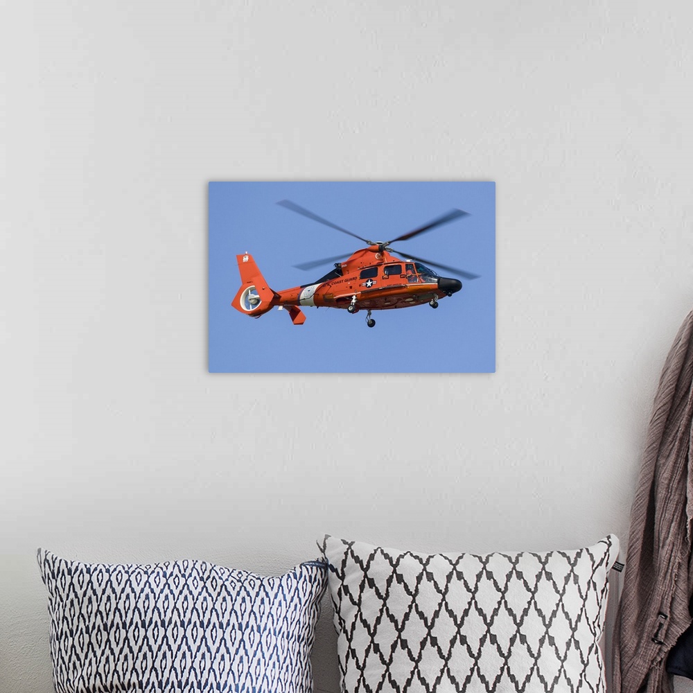 A bohemian room featuring A U.S. Coast Guard MH-65 Dolphin on approach to Boeing Field, Seattle, Washington.