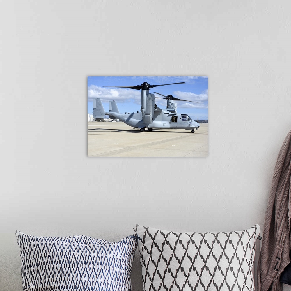 A bohemian room featuring A U.S. Marine Corps MV-22B Osprey taxiing at Marine Corps Air Station Miramar.