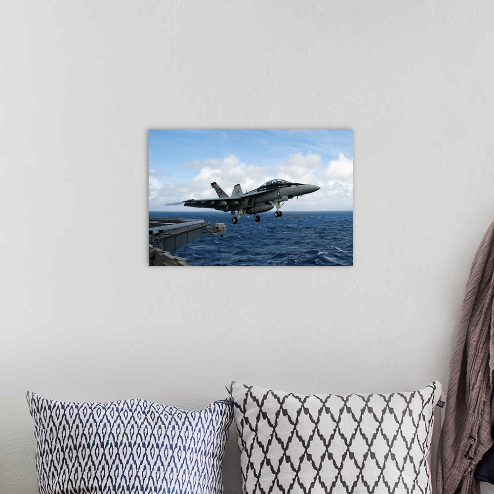 A bohemian room featuring An F/A-18F Super Hornet launches from USS John C. Stennis.