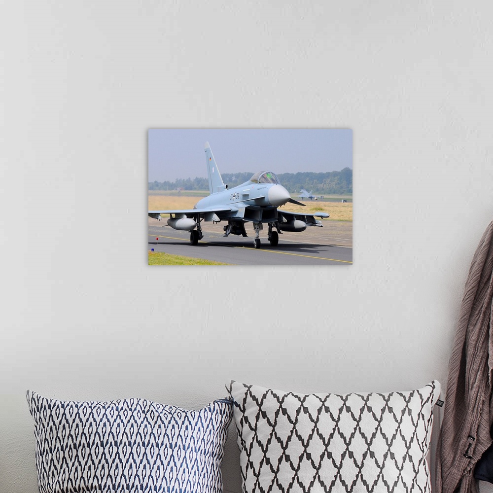 A bohemian room featuring German Air Force Eurofighter EF.2000 taxiing.