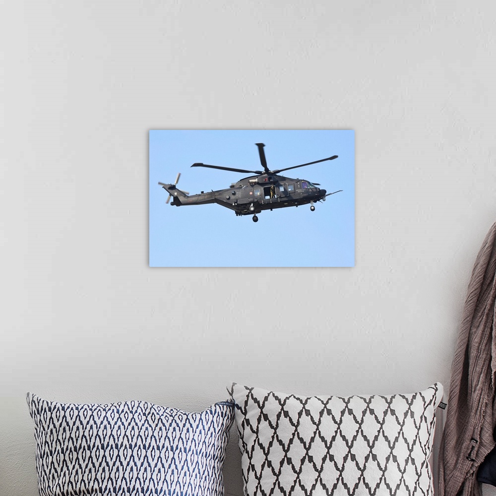 A bohemian room featuring HH-101A Caesar Combat-SAR helicopter of the Italian Air Force landing.