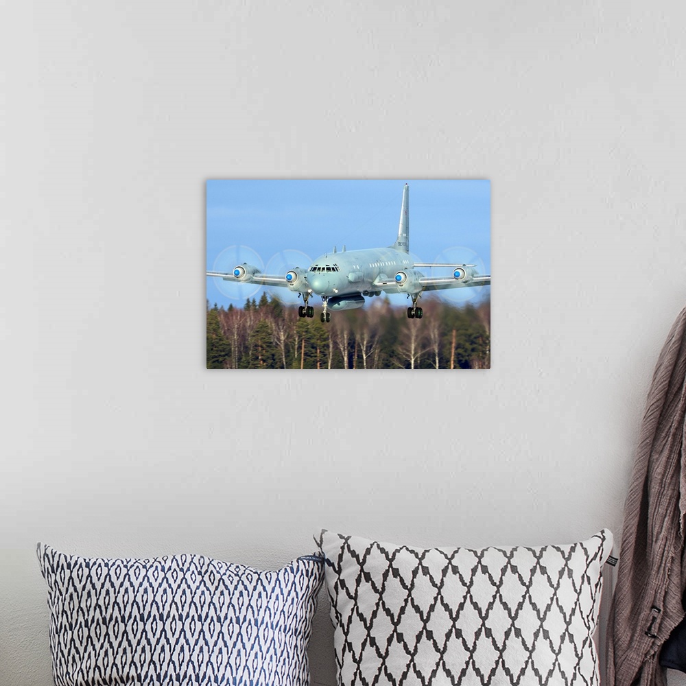 A bohemian room featuring IL-20M reconnaissance aircraft of the Russian Air Force landing.