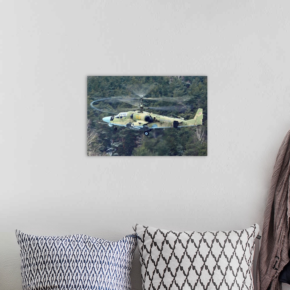 A bohemian room featuring Ka-52 Alligator attack helicopter of the Russian Air Force taking off, Russia.