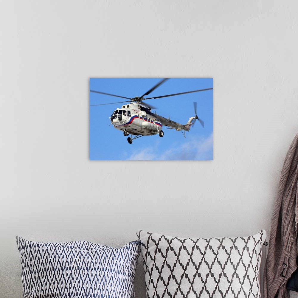 A bohemian room featuring Mil Mi-8AMT transport helicopter of special flight unit landing