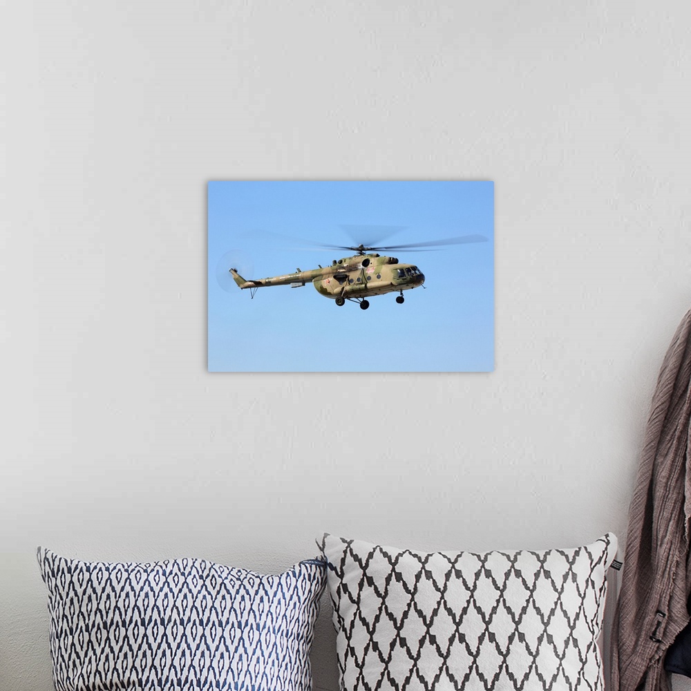 A bohemian room featuring Mil Mi-8MT transport helicopter of Russian Air Force landing.