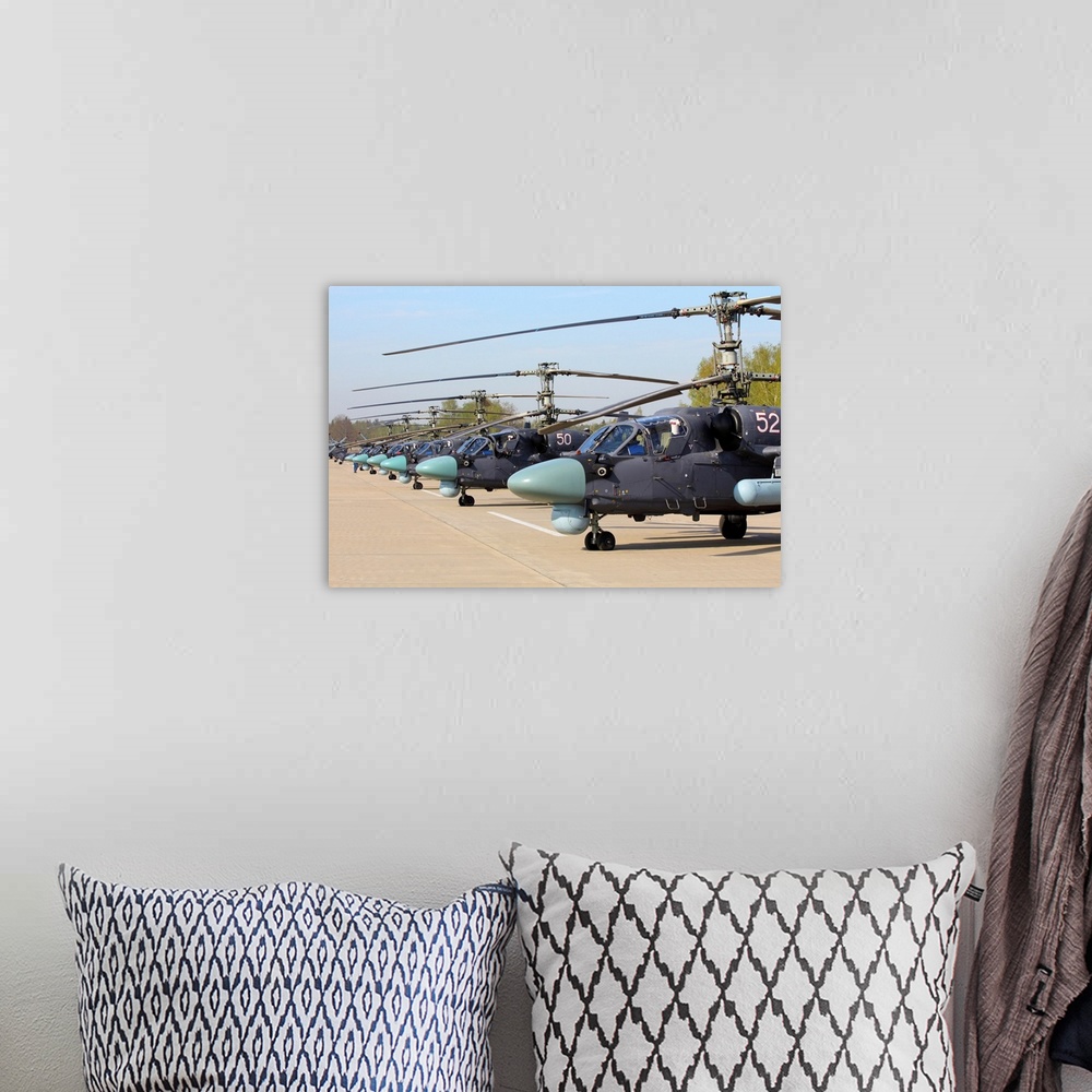 A bohemian room featuring Row of Ka-52 Alligator attack helicopters of the Russian Air Force.