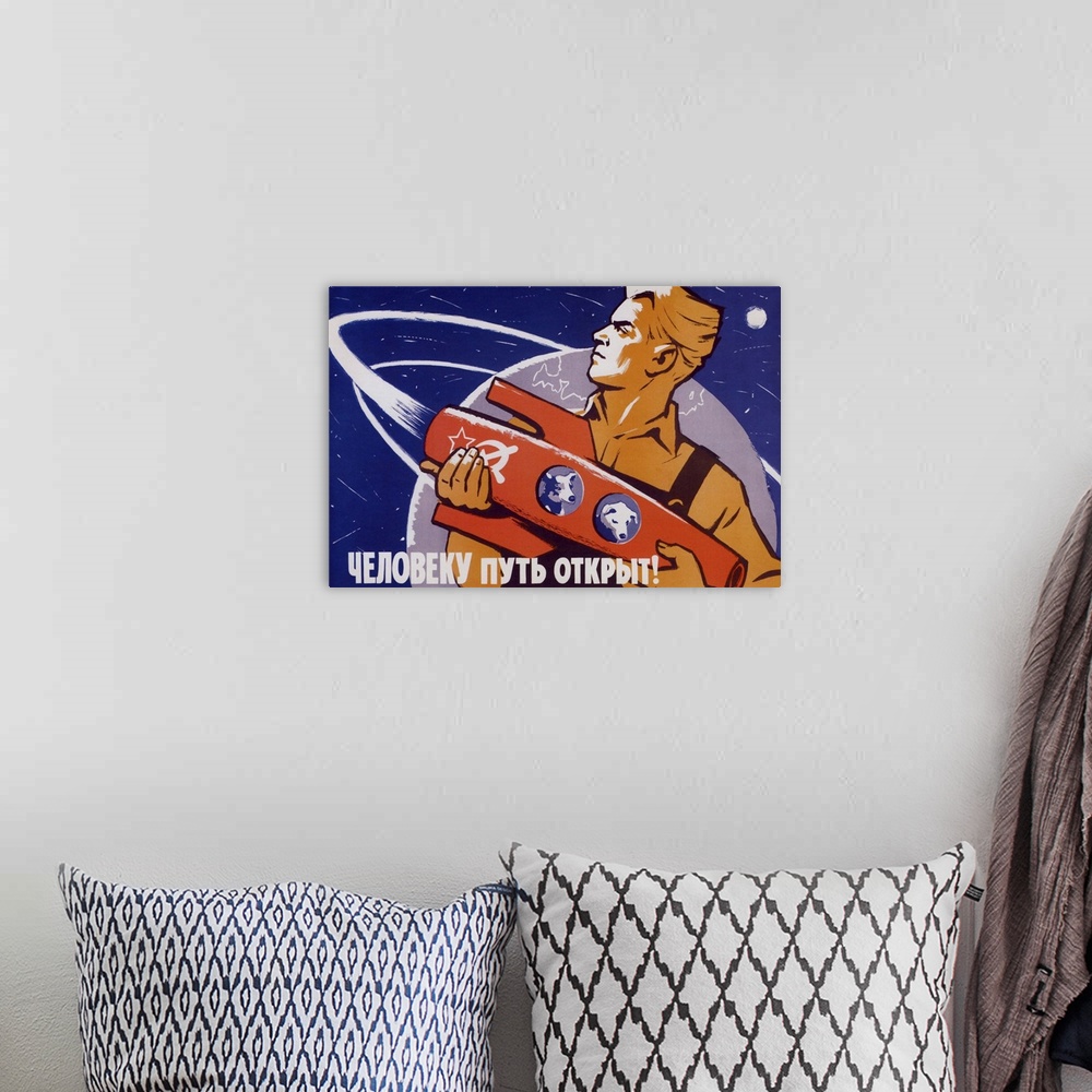 A bohemian room featuring Soviet space poster featuring space dogs, Belka and Strelka, in a rocket being held by a man.